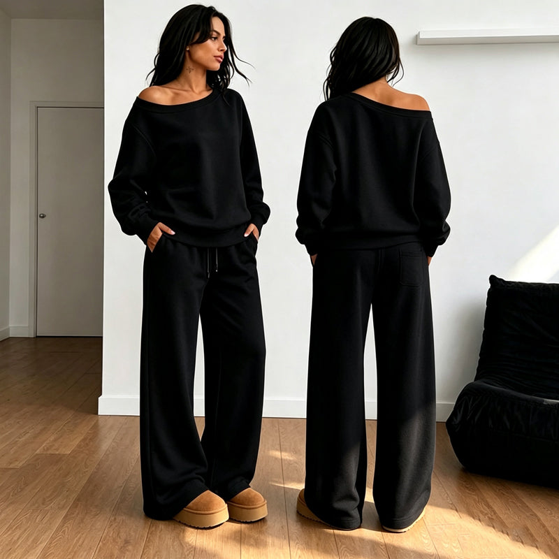 Svart off-shoulder topp og vide bukser